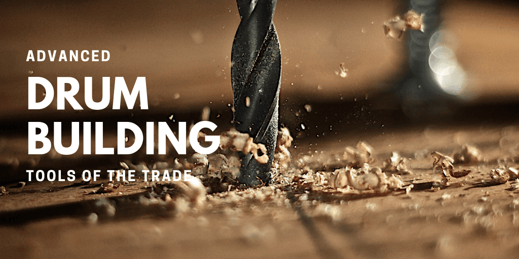 A title slide with a close up picture of a drill bit drilling through a peice of wood and the text that says "Advanced Drum Building Tools of The Trade".