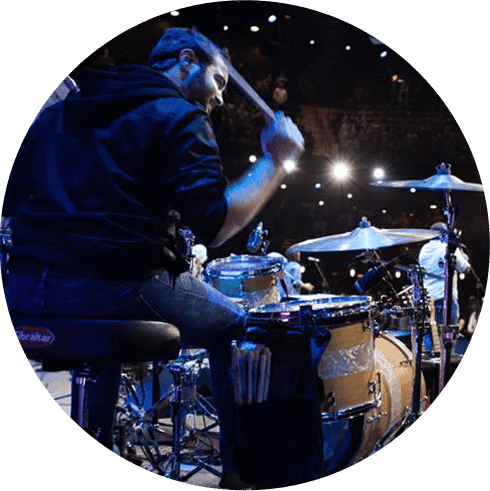 Philip Ellis playing his custom-built drum set